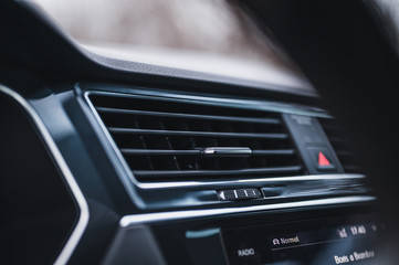 Fototapeta na wymiar Car air conditioning system. Auto interior detail. Car air condition.