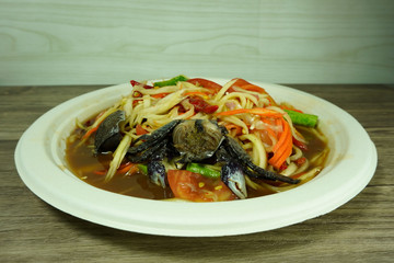 Spicy Green papaya salad (somtam) , famous Thai food concept