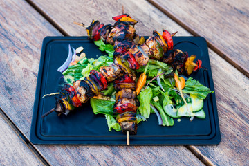Delicious skewers grilled with chicken and vegetables
