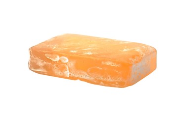 Bar of used soap on white background