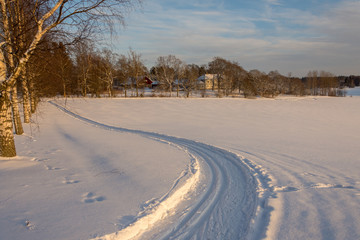 Fototapeta na wymiar Skiing trail in snow