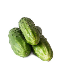 Image of fresh cucumbers isolated on a white background.