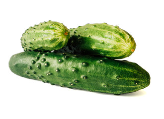 Image of fresh cucumbers isolated on a white background.