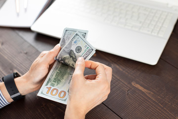 Businesswoman counting money