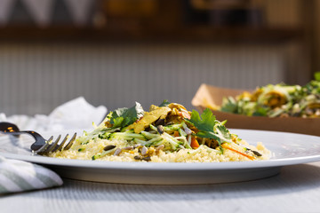 Traditional moroccan chicken tajine with vegetable.