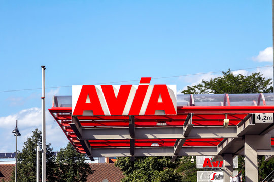 Nurnberg, Germany, Aug 11,2019: Avia sign at gas station against wall. With around 3,000 filling stations Avia is the most widely used group-independent mineral oil brand in Europe.