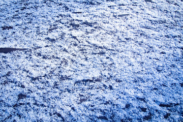 a Snow ice on a wooden background.