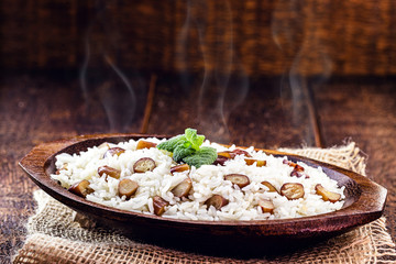 rice with pine nuts, typical Brazilian food during the winter. Meal made with pinaceaes and araucariaceaes, served hot. IN Brazil it is called 