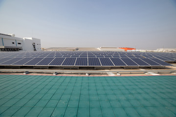 Solar cell panels on roof top of building