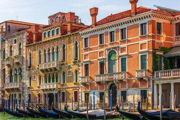 Fototapeta na wymiar Gondolas and palaces of beautiful Venice, Italy