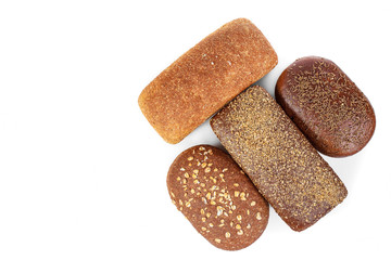 Bakery product. Bread. Beautiful composition with different bread on a white background. Isolate. Space for text. Top view and copy space for text.