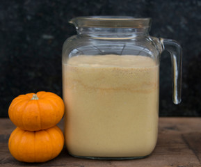 Pumpkin milk or drink with pumpkin and cinnamon