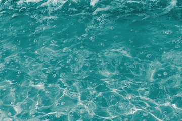 Abstract background of water surface close up.