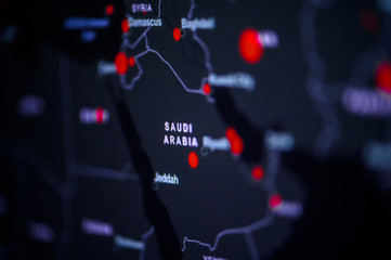 Saudi Arabia. Coronavirus COVID-19 global cases Map. Red Point showing the number of infected. World map on monitor display.