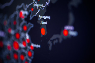 South Korea, Soul . Coronavirus COVID-19 global cases Map. Red Point showing the number of infected. World map on monitor display.