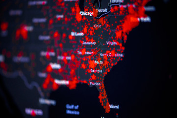 United States, East Coast, New York, . Coronavirus COVID-19 global cases Map. Red Point showing the number of infected. World map on monitor display.