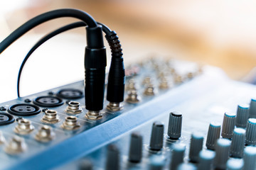 Obraz na płótnie Canvas Professional music production in a sound recording studio, mixer desk