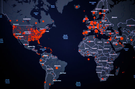 World Map. Coronavirus COVID-19 global cases Map. Red Point showing the number of infected.. World map on monitor display.
