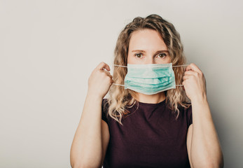 Woman in medical mask, personal protective equipment