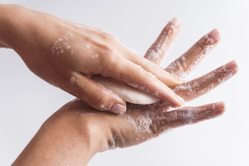 Close-up of female hands with a soap