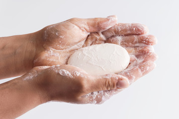 Close-up of female hands with a soap