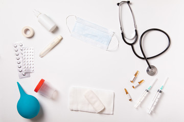 White medical background. Flat lay, top view. Healthcare medicine concept.