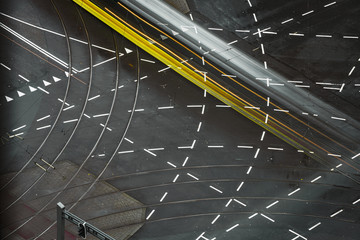 Fast blurred trail of train in traffic motion in illuminated metro, Netherlands.