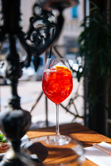 Glass with Aperol coctail in restaurant