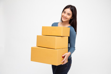 Happy Asian woman holding package parcel box, Delivery courier and shipment service concept