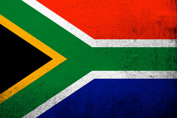 the South Africa National flag. Grunge background