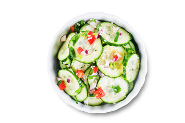 Cucumber spice salad with red onion nd red pepper on a white isolated background
