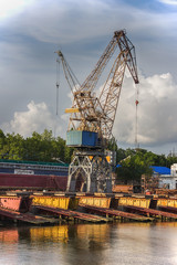 Elevating complex for transshipment of grain and oilseeds as part of a reloading terminal. Transportation of agricultural products and port   cranes - Image.