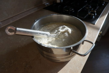 Pancake dough on a table in the kitchen