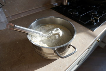 Pancake dough on a table in the kitchen