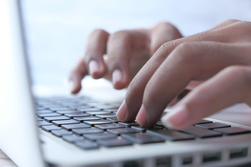 Close up of man hand use laptop,