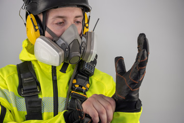 Man in personal protective equipment against falling from a height