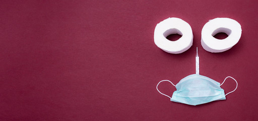 toilet paper, thermometer and medical mask.