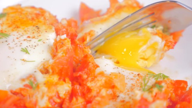 Shakshuka, Fried Eggs in Tomato Sauce for Easter Brunch. Tasty and Healthy Eggs in a Frying Pan. Eggs Poached in Spicy Vegetable Sauce. Mediterranean vegetarian cuisine breakfast.