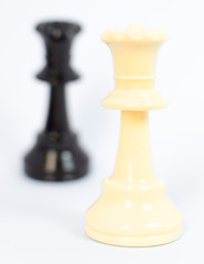 White queen and black king chess with white background