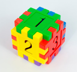 Obraz premium Colorful toy cube of numbers with white background