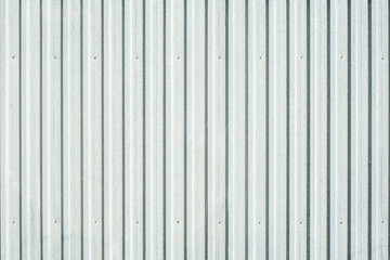 Closeup of grey corrugated steel panel
