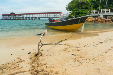 Anchored boat at seashore of Perhentian Island, Malaysia