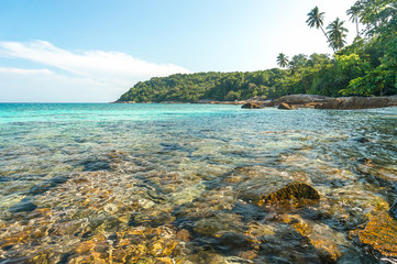 Beach rock with clear water
