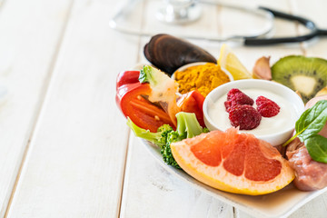 Selection of food to boost immune system - healthy, rich in vitamin and antioxidants, copy space