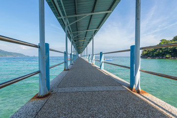 Jetty with green water