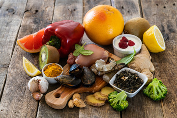 Selection of food to boost immune system - healthy, rich in vitamin and antioxidants, copy space