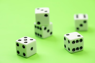 Different numbered dice showing.