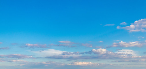 Blue sky with white clouds in sunny weather_