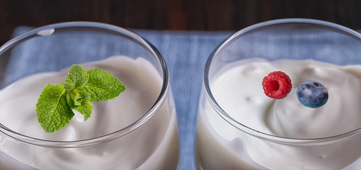 Healthy organic fresh and delicious creamy yogurt in glasses.