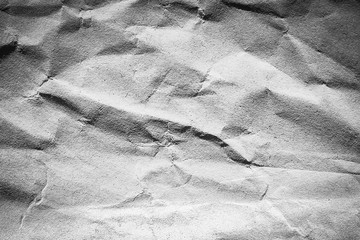 Naklejka premium Crumpled white texture black background for style